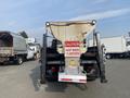 A 2016 RAM 5500 truck with a large rear bed and a caution sign reading "KEEP BACK 15 METERS" attached to the back