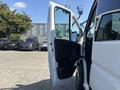 A 2022 RAM Promaster 350 van with the driver's side door open showcasing the interior and seating area