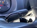Gear shift lever of a 2021 Mercedes-Benz Sprinter 2500 with R N D indicators and a plus sign for manual gear selection
