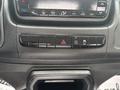Interior dashboard controls of a 2023 RAM Promaster 3500 featuring climate control buttons and hazard light switch