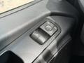 Close-up of the control panel in a 2022 Mercedes-Benz Sprinter showing window controls and buttons