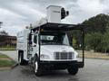 A 2021 Freightliner M2 106 truck with a white exterior and a flatbed equipped with an aerial lift and camera mounted on top