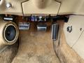 1970 Chevrolet Corvette interior featuring floor pedals a speaker and carpet with a Corvette logo