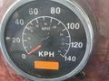 Speedometer of a 2003 International 5600i showing speed in kilometers per hour with a digital display below the dial