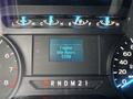 Dashboard display of a 2020 Ford F-150 showing engine idle hours with digital readout and various indicator lights including fuel levels and odometer readings