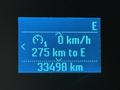Dashboard display of a 2022 Ford F-550 showing speed as 0 km/h distance to empty as 275 km and total distance traveled as 33498 km