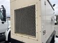 A 2005 Katolight SED60FPJ4 generator with a large metal casing and a grid ventilation panel on one side