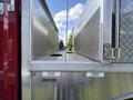 A close-up of the storage compartment on a 1994 Volvo FE 42 with metallic storage bins labeled 200' and 200'
