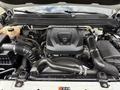 2017 Chevrolet Colorado engine with Duramax 2.8 badge featuring various components including air intake hoses and fluid reservoirs