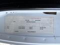 Close-up of a 2015 GMC Savana tire information placard displaying tire sizes and pressure recommendations