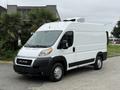 A white 2020 RAM Promaster van with a high roof and cargo space designed for versatility and utility