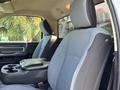 Interior view of a 2020 Ram 2500 with spacious front seats and a console between them