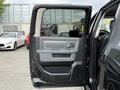 2018 RAM 1500 truck door open revealing interior features such as window controls and door handle