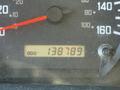 Close-up of an odometer displaying a reading of 138789 on a 2017 Isuzu NPR HD dashboard