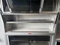 2020 Mercedes-Benz Sprinter 2500 with empty storage compartments and metal shelving inside the cargo area