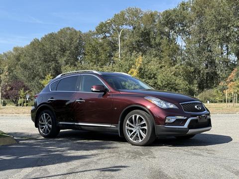 A 2017 Infiniti QX50 in a deep burgundy color with sleek lines and a polished finish parked at an angle showcasing its stylish rims and distinctive front grille