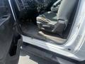 A 2016 RAM 5500 truck with an open driver's door revealing the interior seat and floor area showing signs of wear and dirt