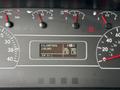 Dashboard of a 2022 International MV607 displaying speedometer fuel gauge and odometer showing 135263 kilometers with various warning lights and indicators