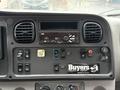 Dashboard of a 2019 Freightliner M2 featuring control buttons a radio display and branding for Buyers Company