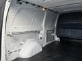 Interior view of a 2020 Mercedes-Benz Metris van showing the empty cargo space with white metal walls and a black floor