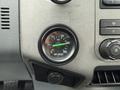 A circular pressure gauge displaying PSI with a green indicator needle pointing between 30 and 90 and labeled "AIR PRESS"