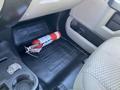 Interior of a 2018 Ford F-150 featuring a fire extinguisher on the floor near the driver's seat