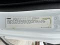 A label on a 2013 Freightliner 114SD truck providing vehicle noise emission control information and compliance details