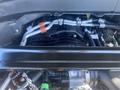 The image shows the engine compartment of a 2020 Ford Explorer featuring various hoses and components of the engine system
