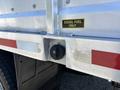 A close-up view of the fuel filler neck on a 2019 Ford F-550 showing a black cap and a label indicating diesel fuel only