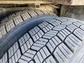 Close-up of a tire tread on a 2014 International 7400 showing intricate patterns and grooves designed for traction and grip