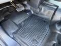 Close-up of a rubber floor mat in a 2024 Ford F-550 with the Ford logo visible on the surface