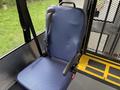 A single blue fabric seat with armrests designed for a 2021 Ford Transit-350 showing a simple and ergonomic design
