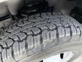 Close-up of a rugged tire tread from a 2020 Chevrolet Express showcasing deep grooves and textured surface designed for traction