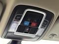 Overhead console featuring controls for lights, sunroof, and SOS button in a 2024 RAM 5500
