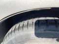 Close-up of a tire from a 2006 Pontiac G6 showing tread patterns and sidewall details