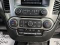 The image shows the control panel of a 2017 Chevrolet Tahoe featuring climate controls knobs and buttons for AC heating and ventilation