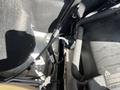 2010 Mercedes-Benz Sprinter engine compartment with various components including pipes and wiring visible
