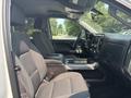 Interior view of a 2017 Chevrolet Silverado 1500 showing the front seats center console and dashboard