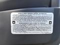 A label detailing vehicle noise emission control information for a 2016 Isuzu NPR-HD including maintenance and design notes