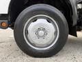 Wheel of a 2018 Hino 195 showing a silver alloy rim and black tire with the brand name and model printed on the sidewall