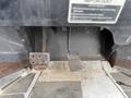 A close-up view of the floor area of a 2011 Kubota RTV 1140 CPX showing rusty metal sections and foot pedals