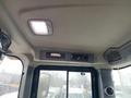 Interior view of a 2016 Hyundai HL940 showing the overhead console with lights and a radio panel