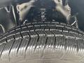 Close-up view of a tire tread on a 2011 Chevrolet Colorado showing detailed patterns designed for traction