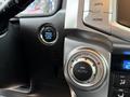 Interior dashboard of a 2018 Toyota 4Runner featuring the engine start stop button and the temperature control dial