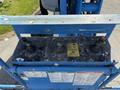 Control panel of a 2012 Genie Z 45/25 featuring various joystick controls and safety instructions