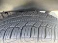 Close-up of a 2017 Chevrolet Colorado tire showcasing a detailed tread pattern indicating good traction and durability