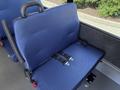 A blue upholstered bench seat with seat belts designed for a 2020 Chevrolet Express