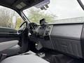 Interior view of a 2011 Ford F-650 showcasing the dashboard and controls with a focus on the Super Duty branding