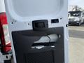 A 2017 RAM Promaster with a partially removed rear door panel exposing internal components and a mounting bracket