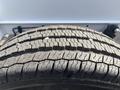 Close-up of a tire with deep treads showing wear patterns on a 2023 RAM Promaster 3500